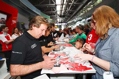 19-May-2013;24-Hour;Deutschland;Frank-Biela;Germany;Nordschleife;Nuerburg;Nuerburgring;Nurburg;Nurburgring;Nürburg;Nürburgring;Phoenix-Racing;Rhineland‒Palatinate;Ring-Boulevard;atmosphere;auto;autograph;motorsport;paddock;portrait;racing;telephoto;wide-angle