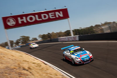 35;35;7-February-2014;Aaron-Zerefos;Andrew-Fisher;Australia;Bathurst;Bathurst-12-Hour;Indiran-Padayachee;NSW;New-South-Wales;Porsche-997-GT3-Cup;Ric-Shaw;SennheiserRentcorp-ForkliftsFiji-Water;auto;endurance;motorsport;racing;wide-angle