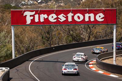 42;51;51;7-February-2014;Andrew-MacPherson;Angus-Chapel;Anthony-Gilbertson;Australia;BMW-E46-GTR;Bathurst;Bathurst-12-Hour;Ben-Porter;Garth-Walden;IMAKKWIKMIT;Jason-Clements;Motorline-BMW;NSW;New-South-Wales;Porsche-911-GT3-Cup-S;auto;endurance;motorsport;racing;telephoto