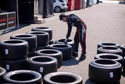 50mm;7-February-2014;Australia;Bathurst;Bathurst-12-Hour;NISMO-Athlete-Global-Team;NSW;New-South-Wales;Topshot;atmosphere;auto;endurance;mechanic;motorsport;paddock;racing;tyre