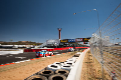 35;35;8-February-2014;Aaron-Zerefos;Andrew-Fisher;Australia;Bathurst;Bathurst-12-Hour;Indiran-Padayachee;NSW;New-South-Wales;Porsche-997-GT3-Cup;Ric-Shaw;SennheiserRentcorp-ForkliftsFiji-Water;auto;endurance;motion-blur;motorsport;racing;sky;wide-angle