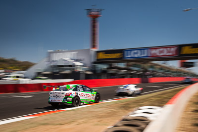 60;60;8-February-2014;Australia;Bathurst;Bathurst-12-Hour;Dylan-Thomas;Hadrian-Morrall;MARC-Focus-GTC;Mick-Benton;NSW;New-South-Wales;auto;endurance;motion-blur;motorsport;racing;sky;wide-angle