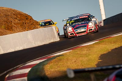 35;35;9-February-2014;Aaron-Zerefos;Andrew-Fisher;Australia;Bathurst;Bathurst-12-Hour;Indiran-Padayachee;NSW;New-South-Wales;Porsche-997-GT3-Cup;Ric-Shaw;SennheiserRentcorp-ForkliftsFiji-Water;auto;endurance;motorsport;racing;super-telephoto