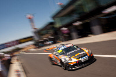 69;28mm;69;9-February-2014;Australia;Bathurst;Bathurst-12-Hour;James-Koundouris;Max-Twigg;NSW;New-South-Wales;Porsche-911-GT3-Cup-S;Steve-Owen;Supabarn-Supermarkets;Theo-Koundouris;auto;endurance;motion-blur;motorsport;racing;sky