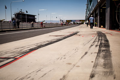 28mm;9-February-2014;Australia;Bathurst;Bathurst-12-Hour;NSW;New-South-Wales;atmosphere;auto;detail;endurance;motorsport;pitlane;racing;skid