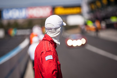 9-February-2014;Australia;Bathurst;Bathurst-12-Hour;Fireman;NSW;New-South-Wales;atmosphere;auto;endurance;fire-marshal;motorsport;pitlane;portrait;racing;telephoto