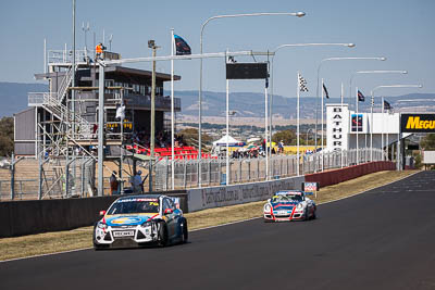 35;70;35;70;9-February-2014;Aaron-Zerefos;Adam-Gowens;Andrew-Fisher;Australia;Bathurst;Bathurst-12-Hour;Garry-Jacobson;Grant-Denyer;Indiran-Padayachee;MARC-Focus-GTC;NSW;New-South-Wales;Porsche-997-GT3-Cup;Ric-Shaw;SennheiserRentcorp-ForkliftsFiji-Water;auto;endurance;motorsport;racing;telephoto