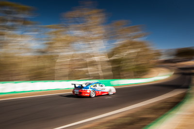 35;35;9-February-2014;Aaron-Zerefos;Andrew-Fisher;Australia;Bathurst;Bathurst-12-Hour;Indiran-Padayachee;NSW;New-South-Wales;Porsche-997-GT3-Cup;Ric-Shaw;SennheiserRentcorp-ForkliftsFiji-Water;auto;endurance;motion-blur;motorsport;racing;sky;wide-angle