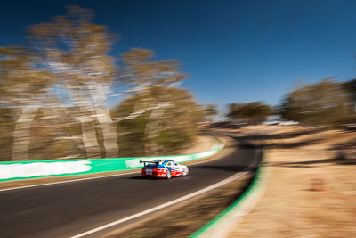 35;35;9-February-2014;Aaron-Zerefos;Andrew-Fisher;Australia;Bathurst;Bathurst-12-Hour;Indiran-Padayachee;NSW;New-South-Wales;Porsche-997-GT3-Cup;Ric-Shaw;SennheiserRentcorp-ForkliftsFiji-Water;auto;endurance;motion-blur;motorsport;racing;sky;wide-angle