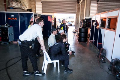 9-February-2014;Australia;Bathurst;Bathurst-12-Hour;HTP-Motorsport;NSW;New-South-Wales;atmosphere;auto;crew;endurance;garage;motorsport;portrait;racing;team;wide-angle