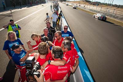 9-February-2014;Australia;Bathurst;Bathurst-12-Hour;Maranello-Motorsport;NSW;New-South-Wales;atmosphere;auto;celebration;crew;endurance;motorsport;racing;team;wide-angle