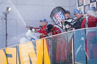 9-February-2014;Australia;Bathurst;Bathurst-12-Hour;John-Bowe;Maranello-Motorsport;Mika-Salo;NSW;New-South-Wales;atmosphere;auto;celebration;champagne;endurance;motorsport;podium;racing;telephoto